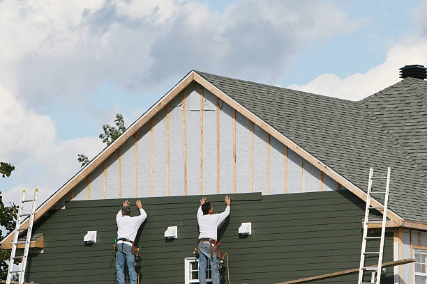 Professional Siding Installation technician working in Crozet, VA